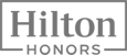 The image displays the logo for Hilton Honors with 